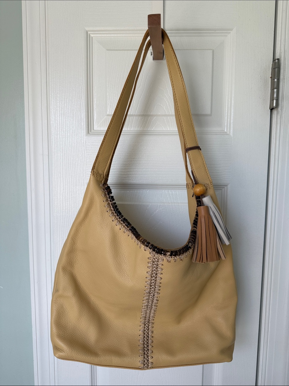 The Sak Warm Yellow Leather Hobo with Tassel Accent